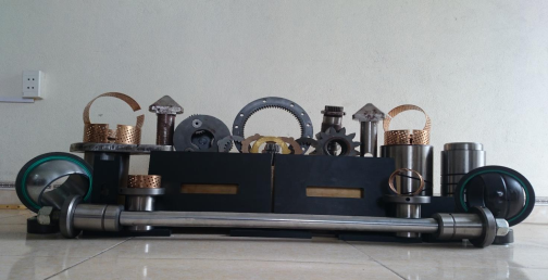 Các chi tiết gia công, ắc trục, tấm trượt bằng nhựa, bạc đồng